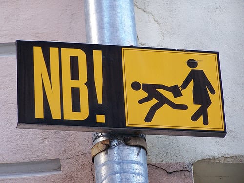 Street sign warning of theft