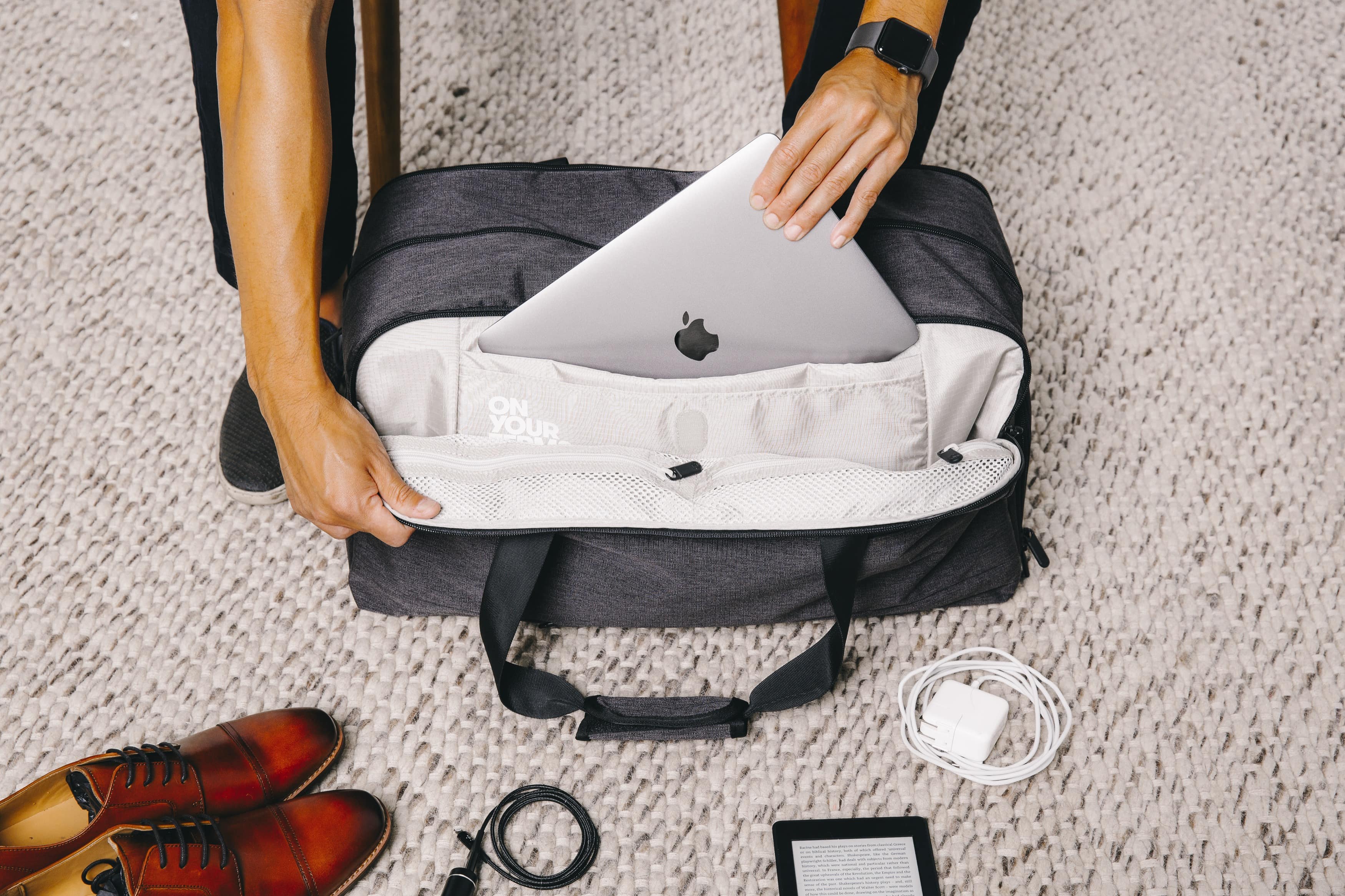 Handbag and laptop store bag in flight