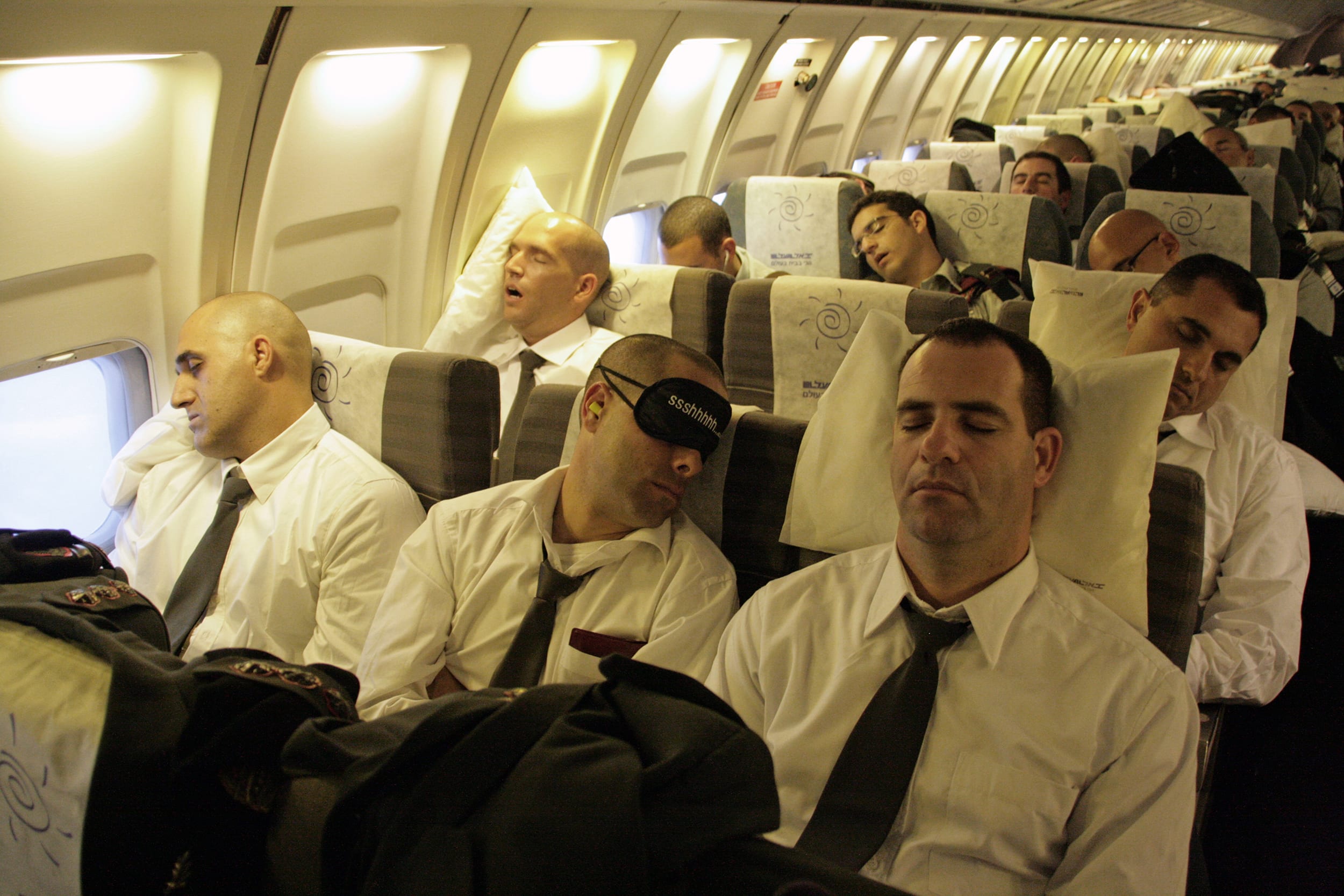 Passengers sleeping on a long haul flight