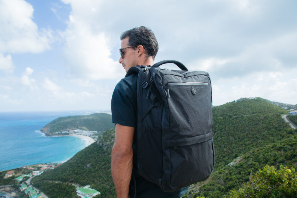 Backpack at the beach overlooking the ocean