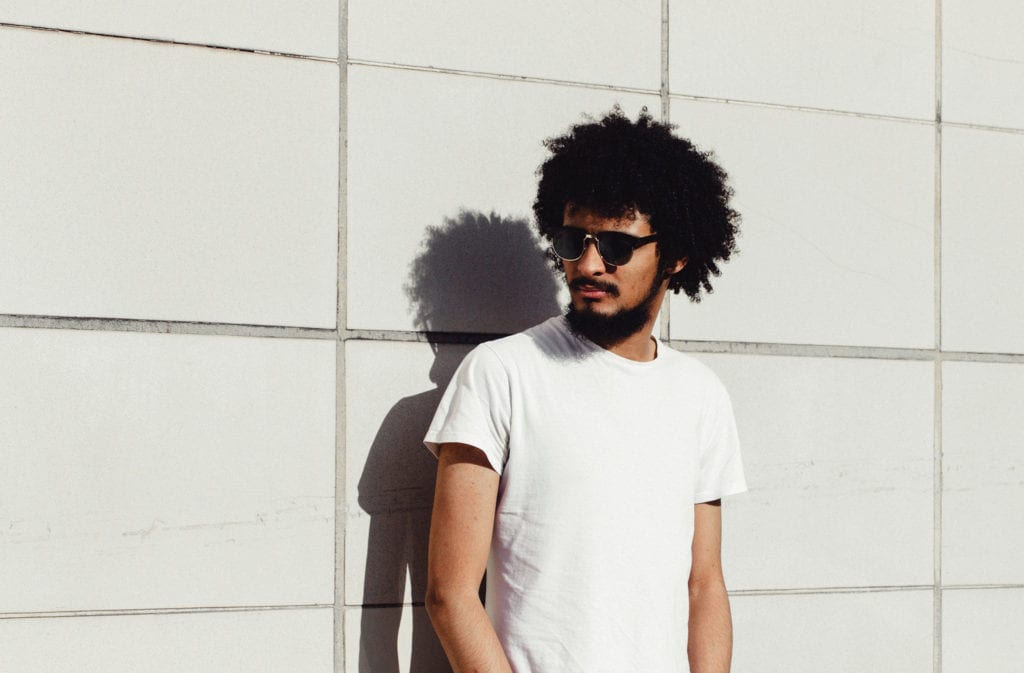 Spanish man in white t-shirt