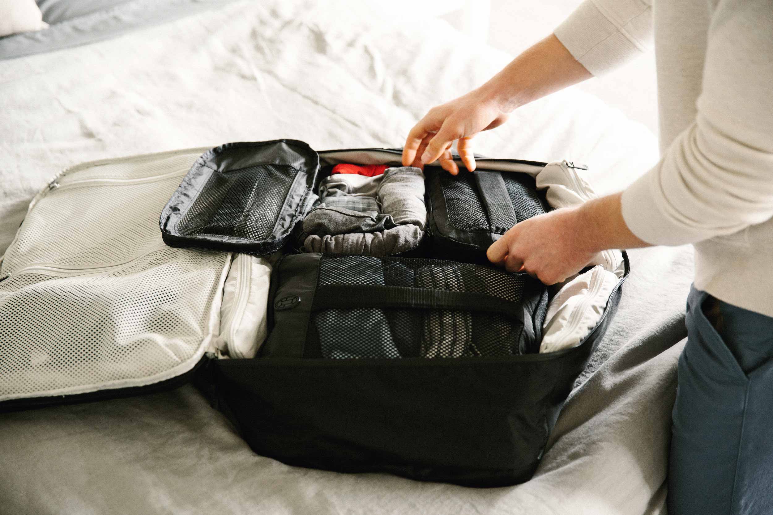 how to pack clothes in a backpack